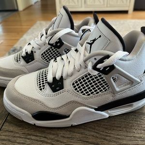 Brand new.  Never been worn . Jordan 4 retro Military Black size 5.5 woman’s. 4Y